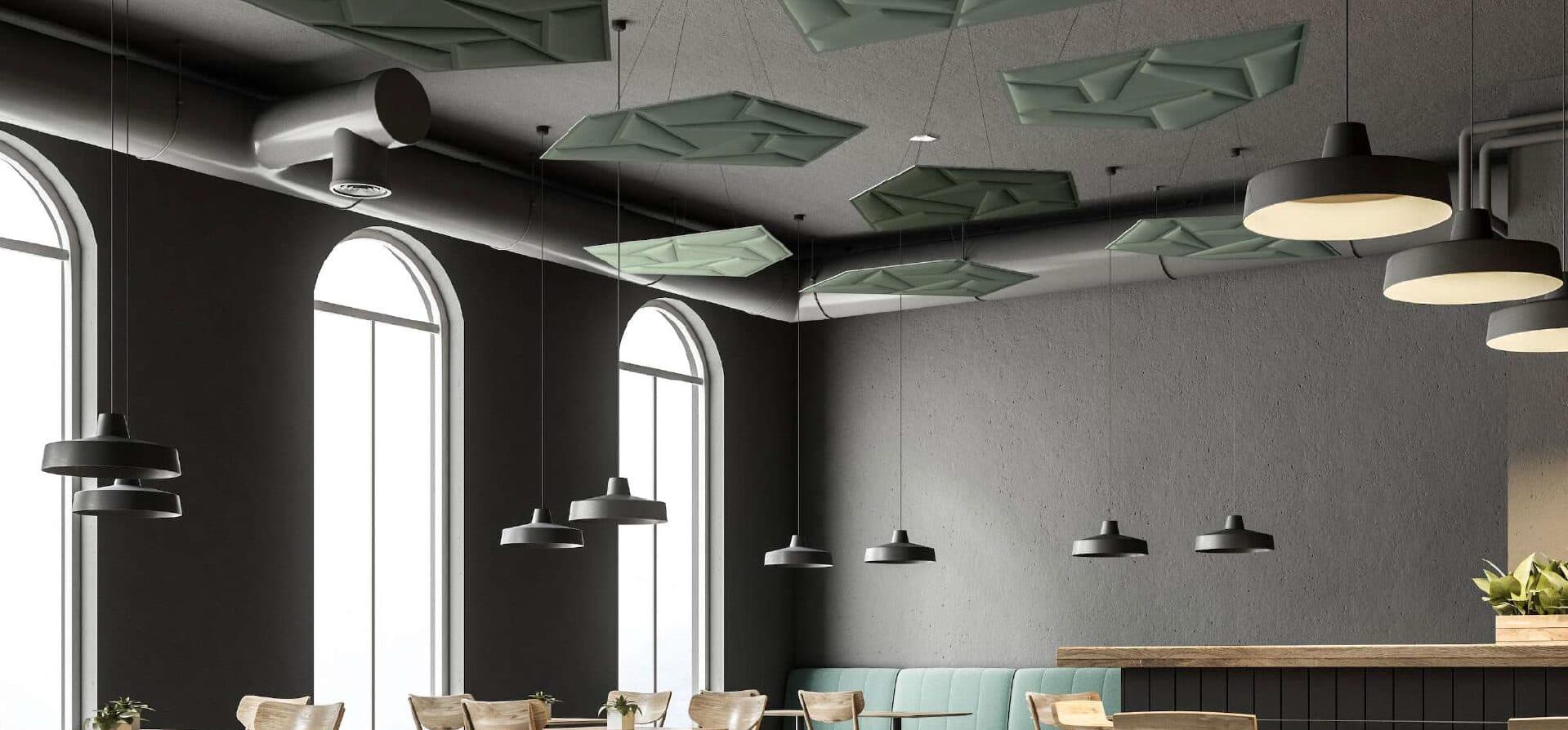 Café with faceted acoustic clouds suspended below a dark ceiling and tall arched windows